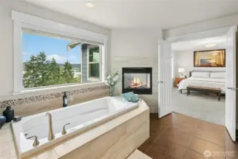 Spa inspired primary bath. views of Lk Sammamish