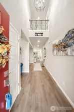 Two story entry with designer lighting & 2nd floor balcony