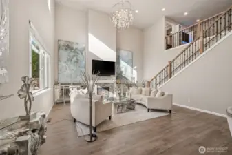 Gas fireplace & stunning chandelier in the great room
