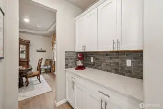 Butler's pantry between kitchen and formal dining room