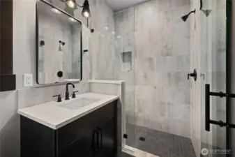 .75 bath on main to support 2nd bedroom and act as powder bathroom