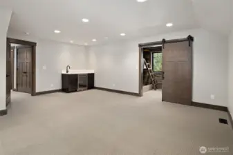 Oversized Bonus Room with wet bar and beverage fridge