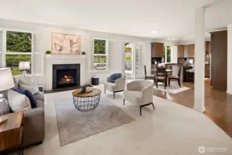 Cozy gas fireplace is perfect for cool evenings.  Plantation shutters throughout this magnificent home!