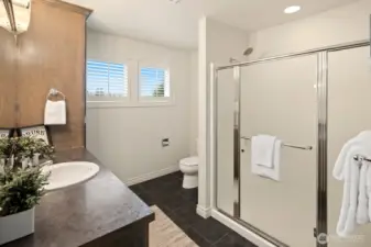 Spacious second bathroom upstairs with generous storage!