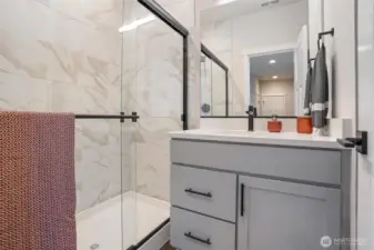 Full bathroom, just outside of 4th bedroom.