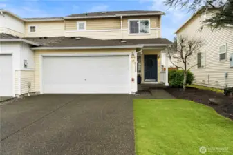 Welcome Home!  Double car garage w/ large driveway and easy care front yard w/ astroturf!