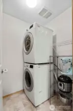 Utility room on main floor with extra storage space.