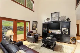 Living room is HUGE and has french doors to the expansive back deck.