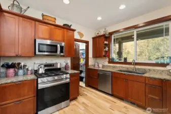 Storage abounds in this light and bright kitchen.