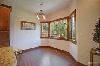 The dining area is just off the kitchen, looking out West