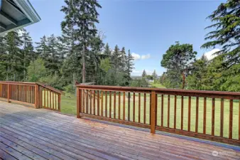 Looking West from the outdoor deck, partial water views with beautiful mountain and territorial views.