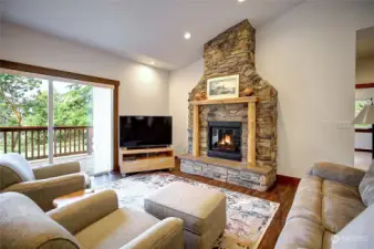 The home features a giant open room off the kitchen and dining area, enjoy the gas fireplace