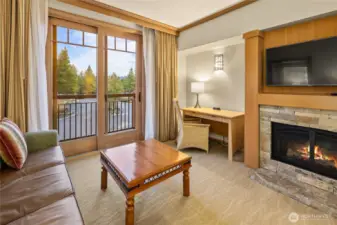 Cozy up to the fireplace on the cooler summer mornings.