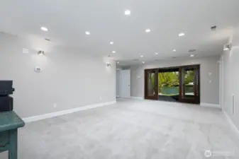 Media Room W/ Doors to Patio and Lake