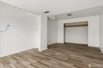 Lots of closet and storage space in this bedroom.