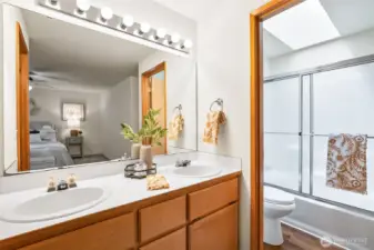 Primary double sink vanity and bathroom
