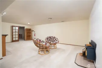 Huge downstairs rec room with fireplace