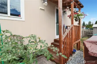 The back door opens directly into the kitchen and laundry area for everyday convenience and functionality.