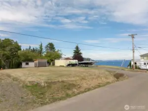 Property corners are flagged. Half acre + (22216 approx.)