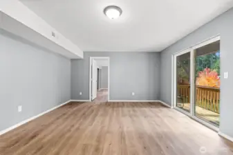 Flex space with exit to lower patio.