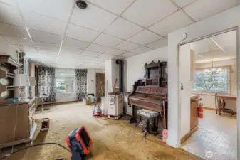 Large living room waiting for your creativity! Large windows, open floor plan