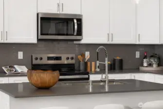 Photos are of a similar model and are for illustrative purposes only. Actual home, finishes, and features may vary.