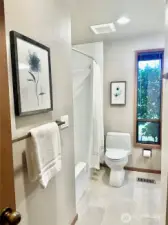Full guest bathroom at lower level.