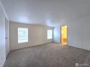 Comfortable and inviting primary suite private access to the en-suite bath—your own peaceful retreat.