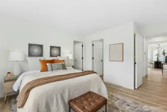 Main level bedroom with attached bathroom