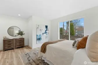 Main level bedroom with attached bathroom