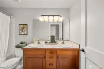 full bath off the hallway shared doucle vanity sinks
