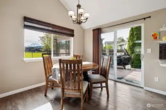 THis is the dining room, and note the Mt Rainier view in the window in the left of this photo. The land adjacent to this home is owned by the City of Orting and it holds one of their wellheads, so there won't be anyone building next door to block your view.
