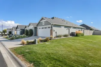 Fenced backyard, wide driveway!