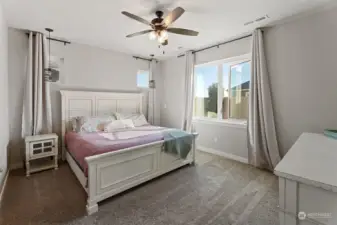 primary bedroom with wide open windows!