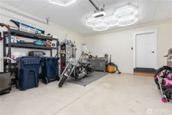 The garage has custom ceiling a custom lighting installed.