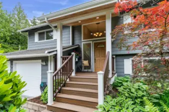 Gorgeous custom Trex deck entry with covered seating area