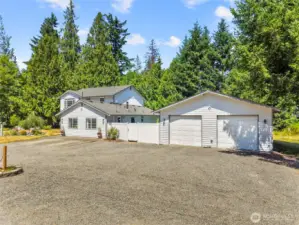 Ample driveway parking and 2 bay 900 sq ft garage.