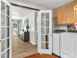 Laundry room, with pass through to the green family room from the kitchen.