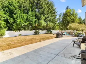 Newer concrete patio and all new white vinyl fencing