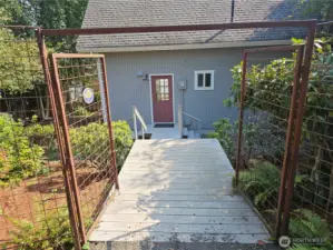 Steps down to main level of home