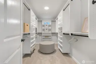 Beautiful built-in Primary Walk in Closet is an absolute dream!