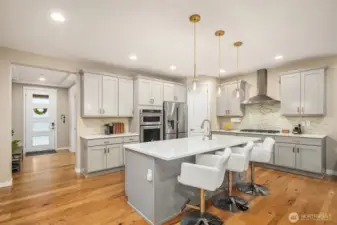 Entrance foyer leads to spacious kitchen and great room