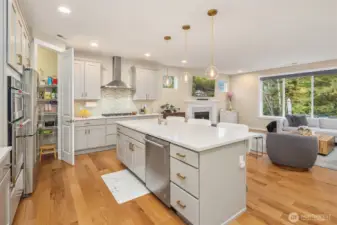 Oversized island offers full size eating bar - note the walk-in pantry!