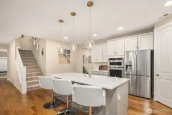 Updates/upgrades include wide-plank engineered flooring, updated lighting fixtures, A/C, tankless water heater, custom closets and more!