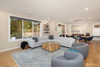 Looking back over the living/family space to dining area and office/flex room