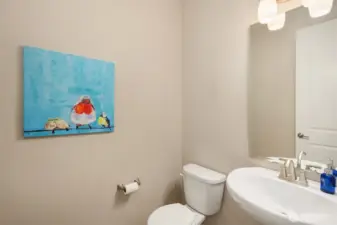 Just off the entrance foyer is a powder room for your guests, separate from the guest suite.