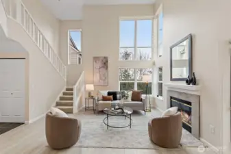 Living Room-soaring ceilings and dramatic two-story windows!