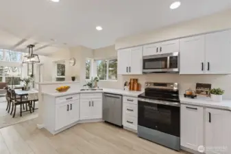 Fully renovated kitchen with new SS appliances.