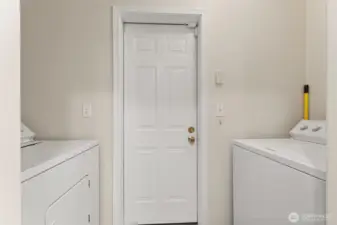 Spacious laundry room off kitchen