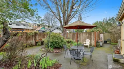 Serene and beautiful back patio area is fully fenced. Back alley parking with gate acces.